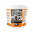 White plastic tub of nettex agri ultra concentrate colostrum with orange black label showing lambs providing energy