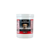 White plastic container of nettex first life puppy colostrum 340g colostrum derived supplement for bitches colostrum