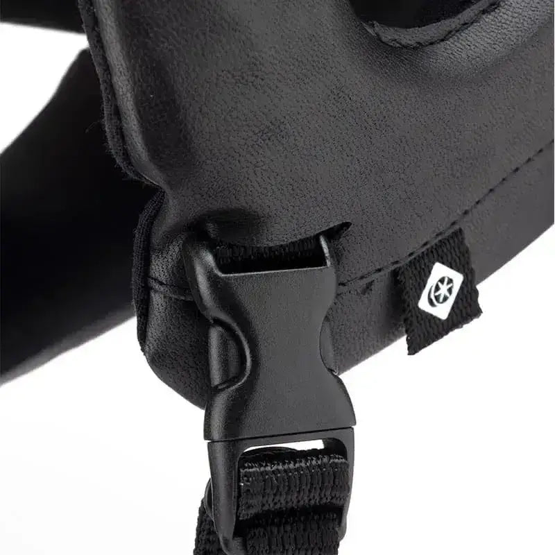 Back of new charles owen race ii riding hat showing black leather strap with black plastic buckle and branded tag