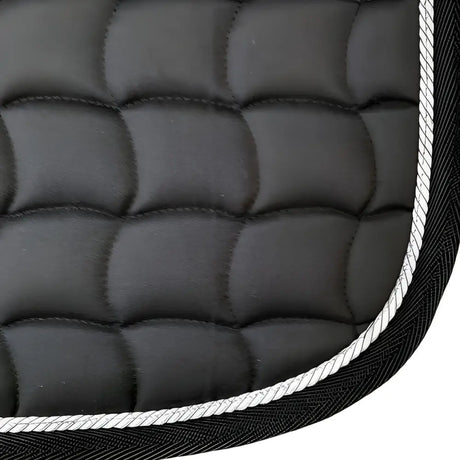 Quilted black dressage saddle pad with white piping from NEW GALLOP for optimal style