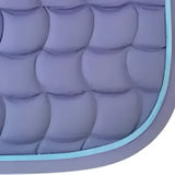 Purple quilted dressage saddle pad with contoured spine and light blue stitched border featuring anti-rub girth pad