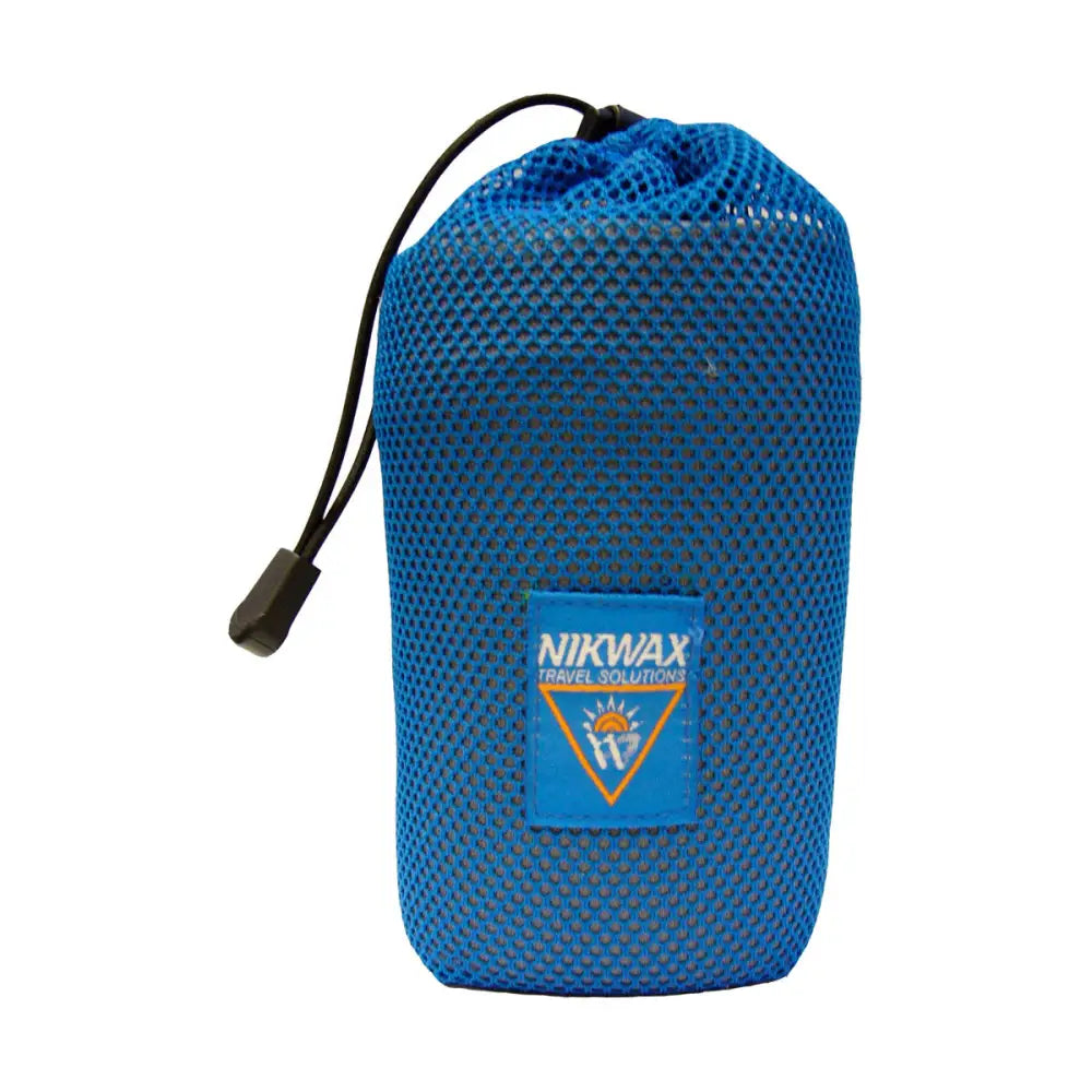 Blue mesh travel sack with black drawstring and branded patch for nikwax trek towel blue travel towel