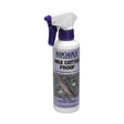 White nikwax wax cotton non-aerosol spray bottle with purple trigger for waterproofing waxed cotton fabric