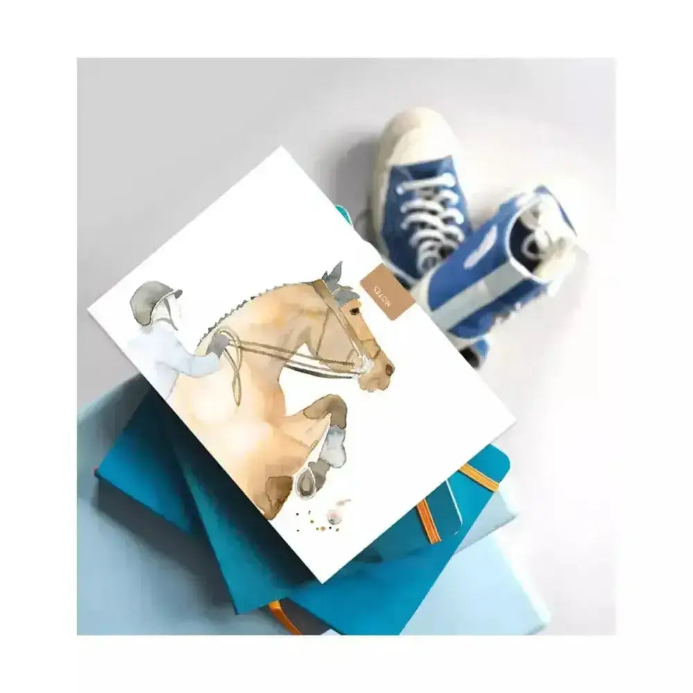 White handy a6 pocket notebook with light brown jumping competition horse and rider watercolor illustration cover