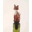 A charming red and white painted fox bottle saver novelty wine stopper with a glossy finish for wine bottles