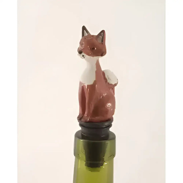 A charming red and white painted fox bottle saver novelty wine stopper with a glossy finish for wine bottles