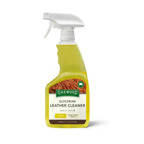 A yellow oakwood glycerine leather cleaner spray bottle with white nozzle and leather texture label for hydrating leather