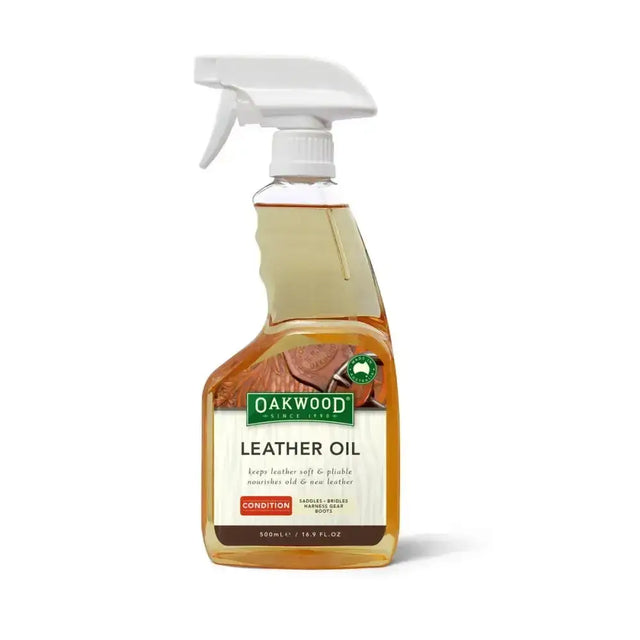 Oakwood leather oil in a clear spray bottle with white trigger nozzle containing amber leather oil for tack accessories care