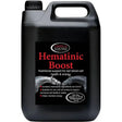 Black plastic jug of omega equine hematinic nutritional supplement supports haemoglobin with iron and b12 for horses