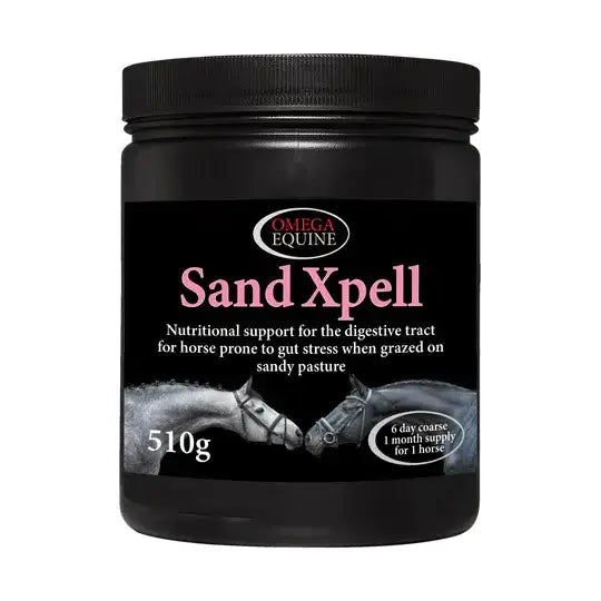 Black cylindrical container of omega equine sandxpell 510g nutritional supplement for horses on sandy pasture