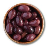 A bowl of glossy dark purple organic kalamata whole olives in a rustic brown ceramic dish not stuffed green olives
