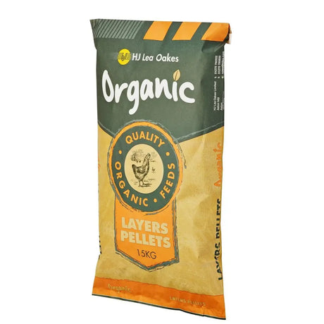 A 15kg green and orange paper sack of hj lea oakes organic layers pellets feed with chicken illustration