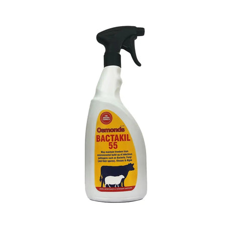 White plastic spray bottle with black nozzle and yellow label featuring osmonds bactakil broad-spectrum biocides and cow silhouettes