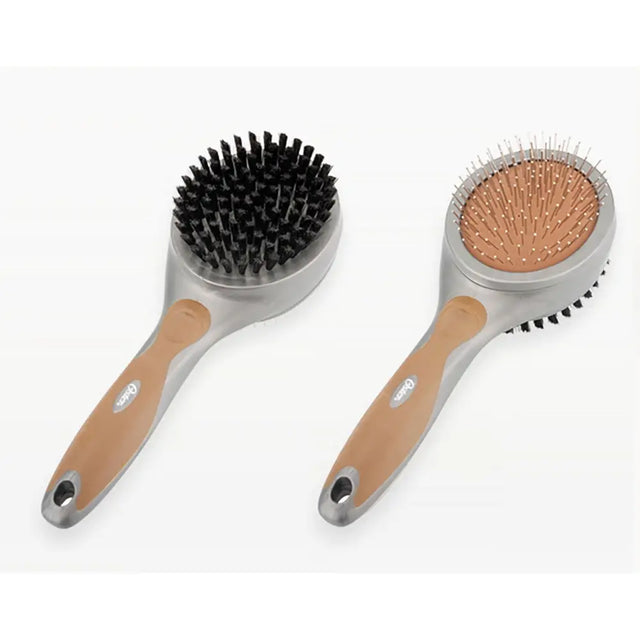 Two oster premium combo ergonomic hairbrushes with black and copper bristles for grooming pet’s fur on white background