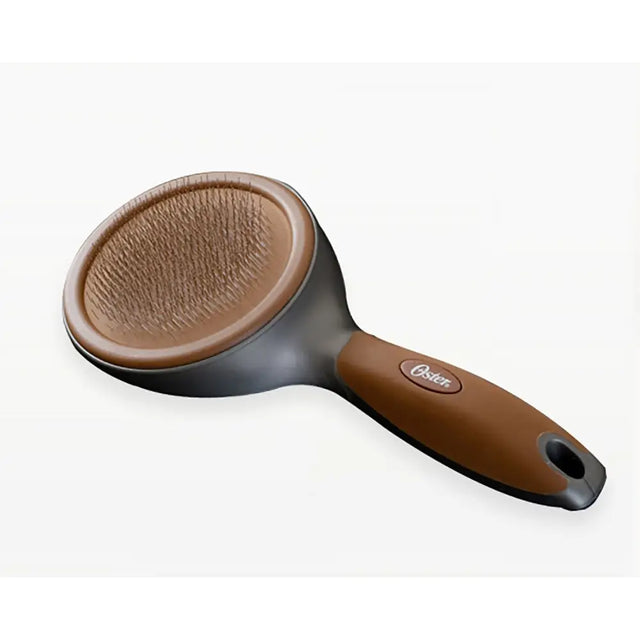 Brown and black oster premium slicker brush with rounded head and dense bristles for pet’s dead shedding coat care