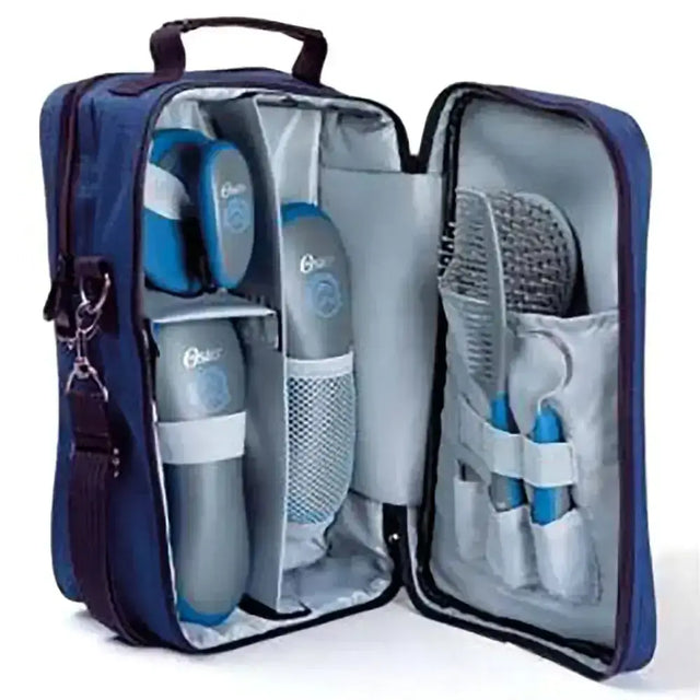 Oster seven piece grooming kit with gray and blue electric pet brush, coarse curry comb, and stiff grooming brush neatly organized