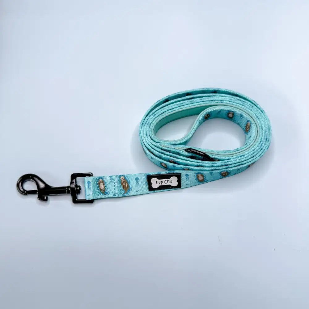 Otterly lovely 5ft dog lead in light teal with tan dog pattern and black metal hardware, perfect for walks