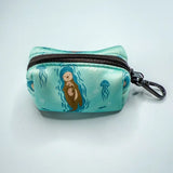 Turquoise fabric otterly lovely poo bag holder with otter and jellyfish design, black zipper, metal clip for easy access and stress-free cleanups
