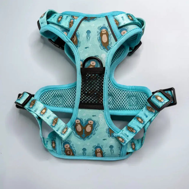 Turquoise otterly lovely tactical dog harness with brown otters jellyfish pattern black mesh and adjustable straps for close control busy areas