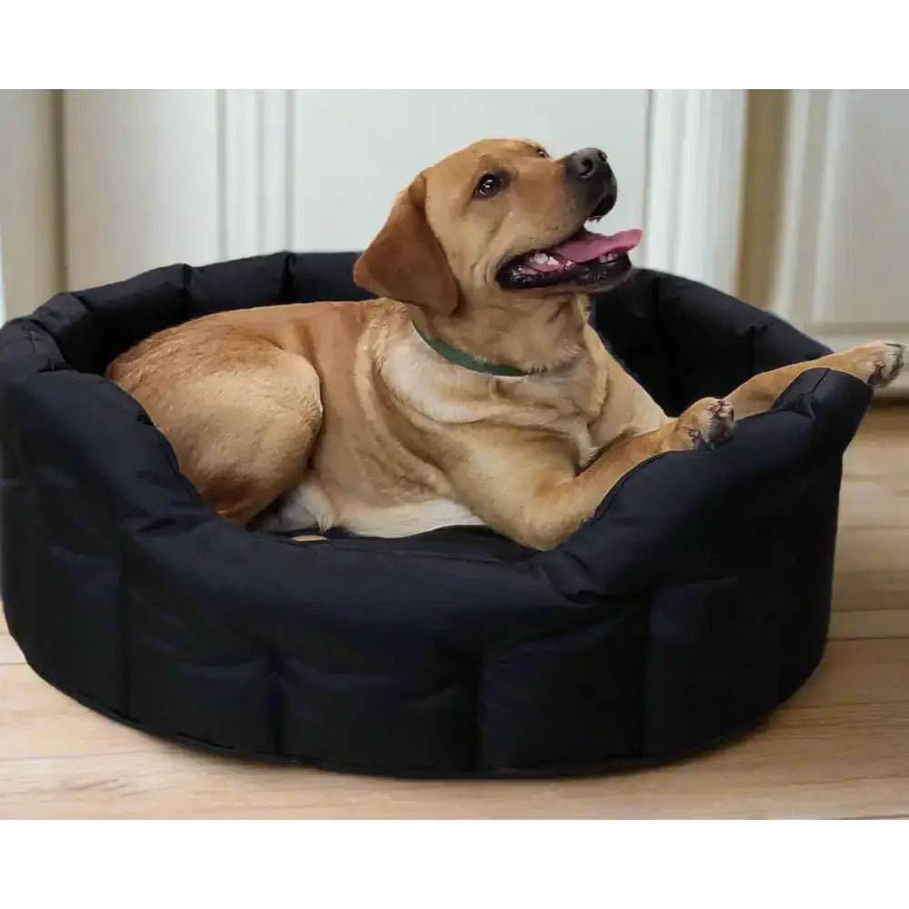 Black quilted country dog tough heavy duty oval dog bed with plush cushioned edges and waterproof design