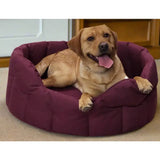 A plush deep purple heavy duty oval country dog tough waterproof dog bed with quilted design