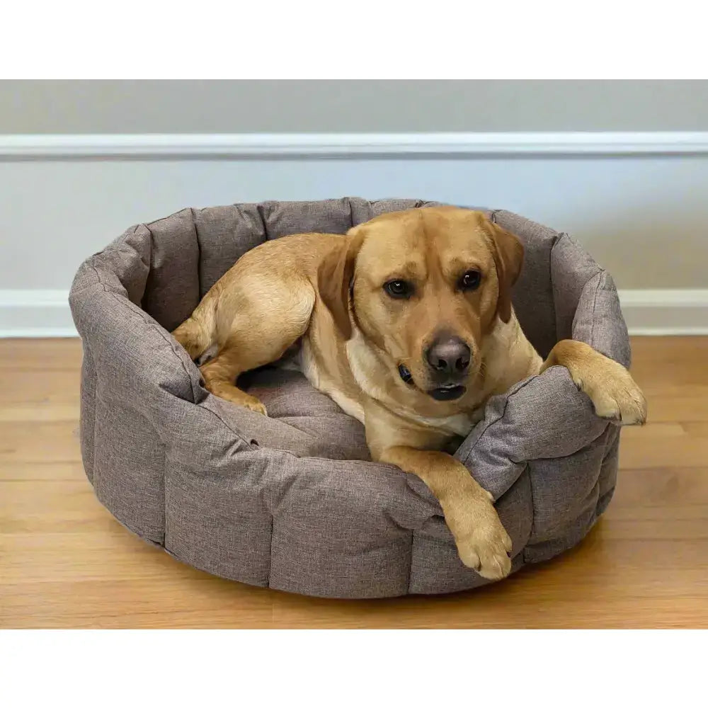 Cozy gray quilted country dog tough heavy duty oval dog bed with plush cushioned interior and waterproof sides