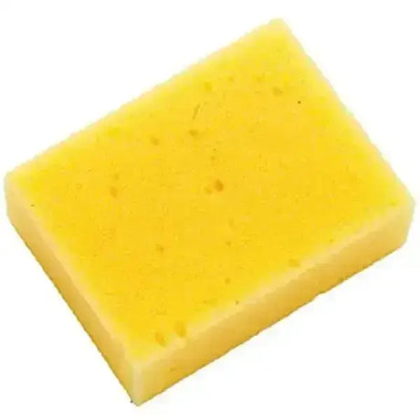 A handy sized yellow rectangular sponge with a porous surface from a pack of 30 small tack cleaning sponges