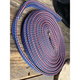 A coiled padded lunge line 8m in vibrant blue and pink braided design perfect for windsor padded lunge use