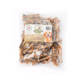 A clear plastic bag of brown dried farm chicken feet from paddock farm perfect as natural dog treats 1kg