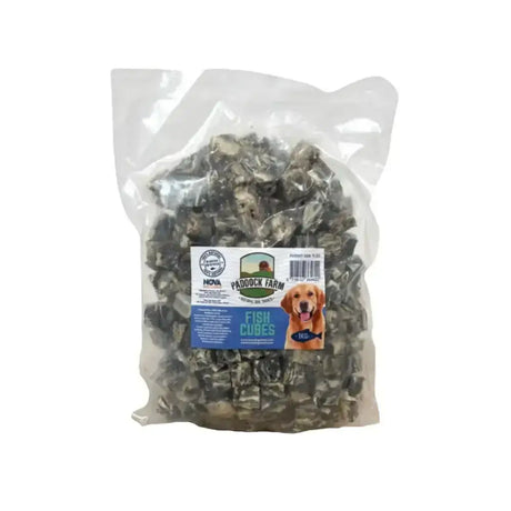 A clear plastic bag of dark gray irregular paddock farm fish cubes labeled farm fish cubes for easy feeding