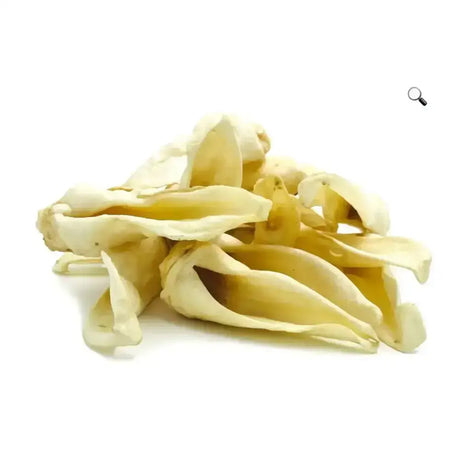 Pile of pale yellow dried lamb ears from paddock farm lamb perfect for pet treats and chews