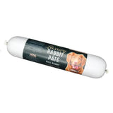 A 400g white cylinder of paddock farm luxury rabbit pâté with a dark label featuring a golden retriever image