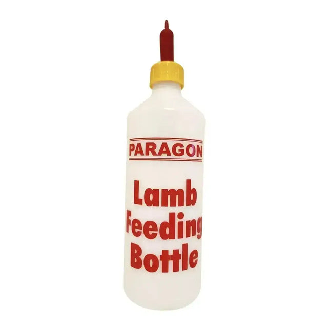 White plastic paragon lamb feeding bottle with yellow screw-on lamb teat cap and red nipple lamb teat included