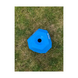 Bright blue hexagonal plastic balance disc with central hole from parallax snack for multi sided feeding fun