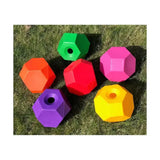 Brightly colored hexagonal plastic parallax snack multi sided feeding dog toys with central holes for sided feeding ball use