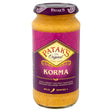 A glass jar of patak korma sauce 450g with rich creamy coconut sauce and aromatic spices for easy cooking