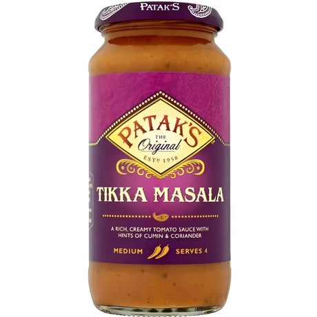 Patak tikka masala sauce in a 450g glass jar with purple label and gold trim perfect for flavorful meals