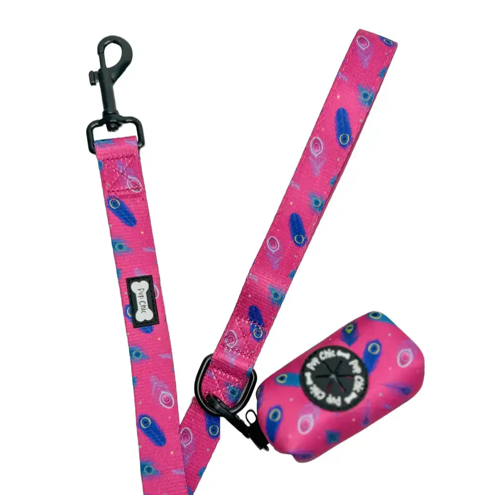 Pink peacock power 5ft dog lead with blue feather pattern black metal hardware and matching poop bag dispenser