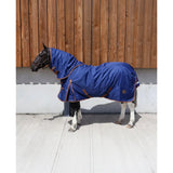 A navy blue perf detachable neck turnout rug with brown trim and adjustable straps for lightweight horse protection