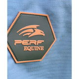 Orange and black hex patch with eagle logo and perf equine text on blue fabric of standard 0g lightweight turnout rug