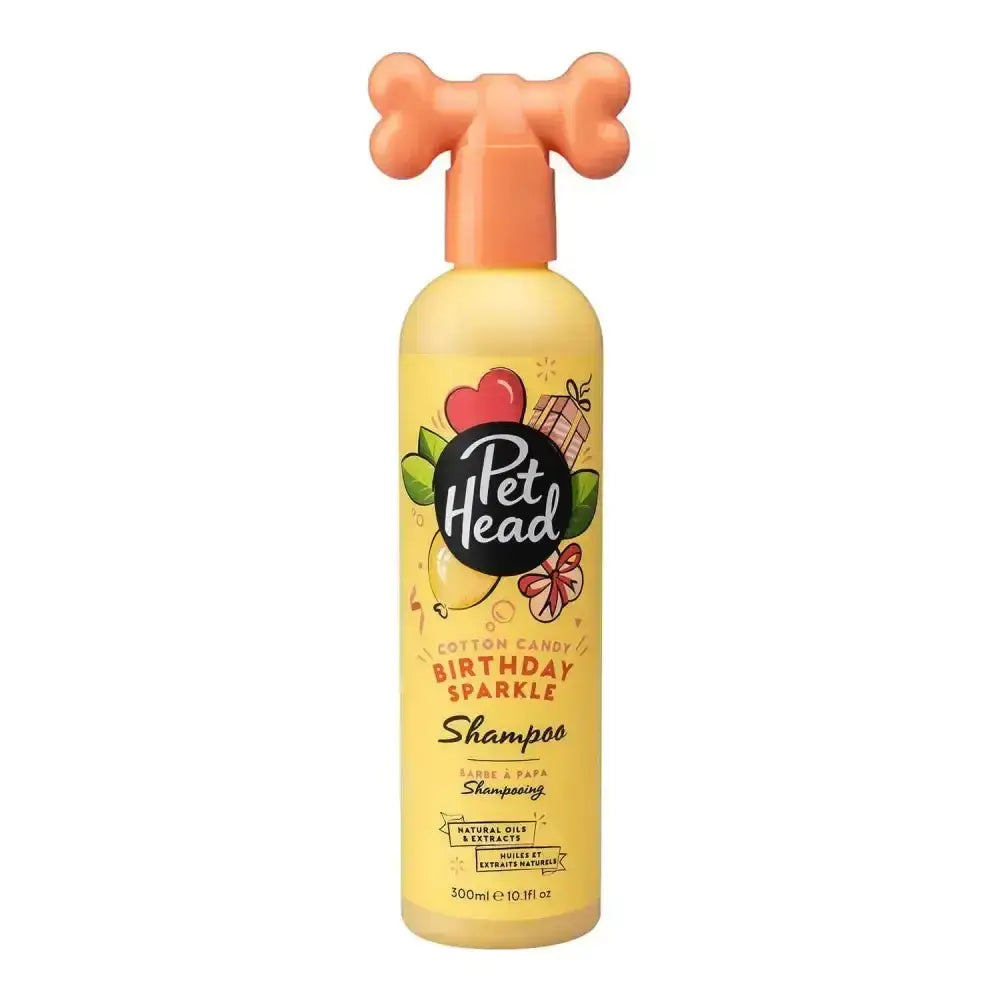 Yellow pet head birthday sparkle shampoo bottle with peach bone-shaped pump for pet grooming and fun baths