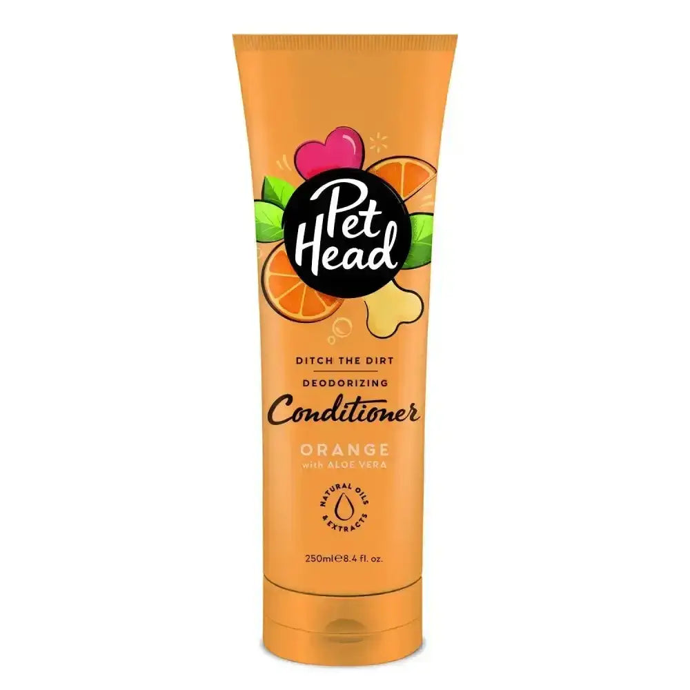 Orange pet head ditch the dirt deodorising conditioner tube with black logo and fruit illustrations with orange peel oil