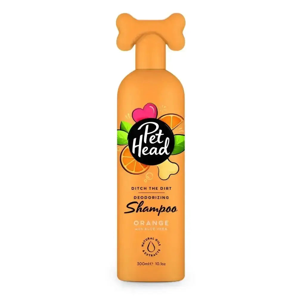 Pet head ditch the dirt yummy orange shampoo bottle with bone pump and citrus label for rolling outdoors use