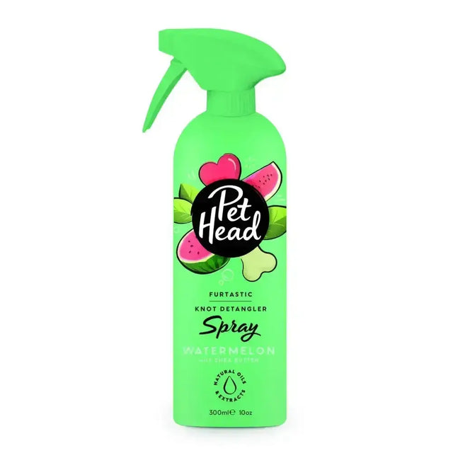 Bright green pet head furtastic knot detangler spray watermelon scent with playful pink heart label to effortlessly fix knots
