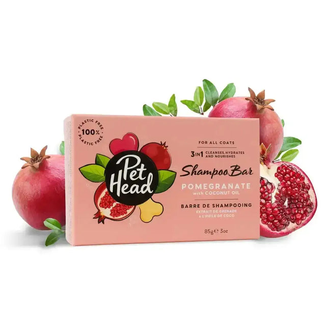 Pink rectangular box of pet head pomegranate shampoo bar with black logo and pomegranate illustrations for pets