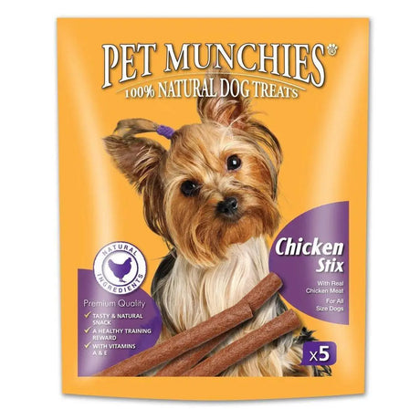 Orange package of pet munchies munchies chicken stix 100% natural dog treats with yorkshire terrier and chicken sticks