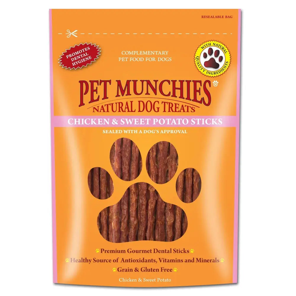 Orange resealable bag of pet munchies dog natural chicken and sweet potato paw print shaped munchies dog treat