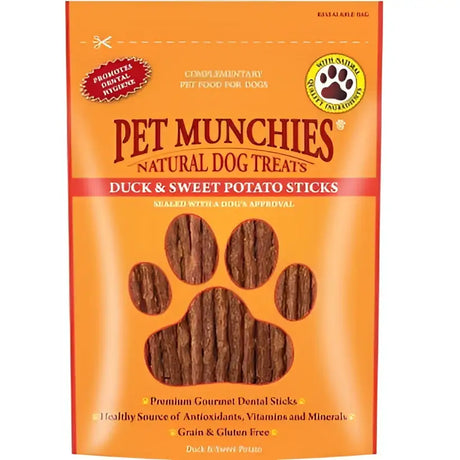 Orange package of pet munchies dog natural treat dck with sweet potato sticks for healthy snacking