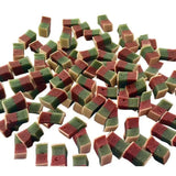 Colorful layered pet munchies training treats sushi with green and red top layer over a beige base for training fun