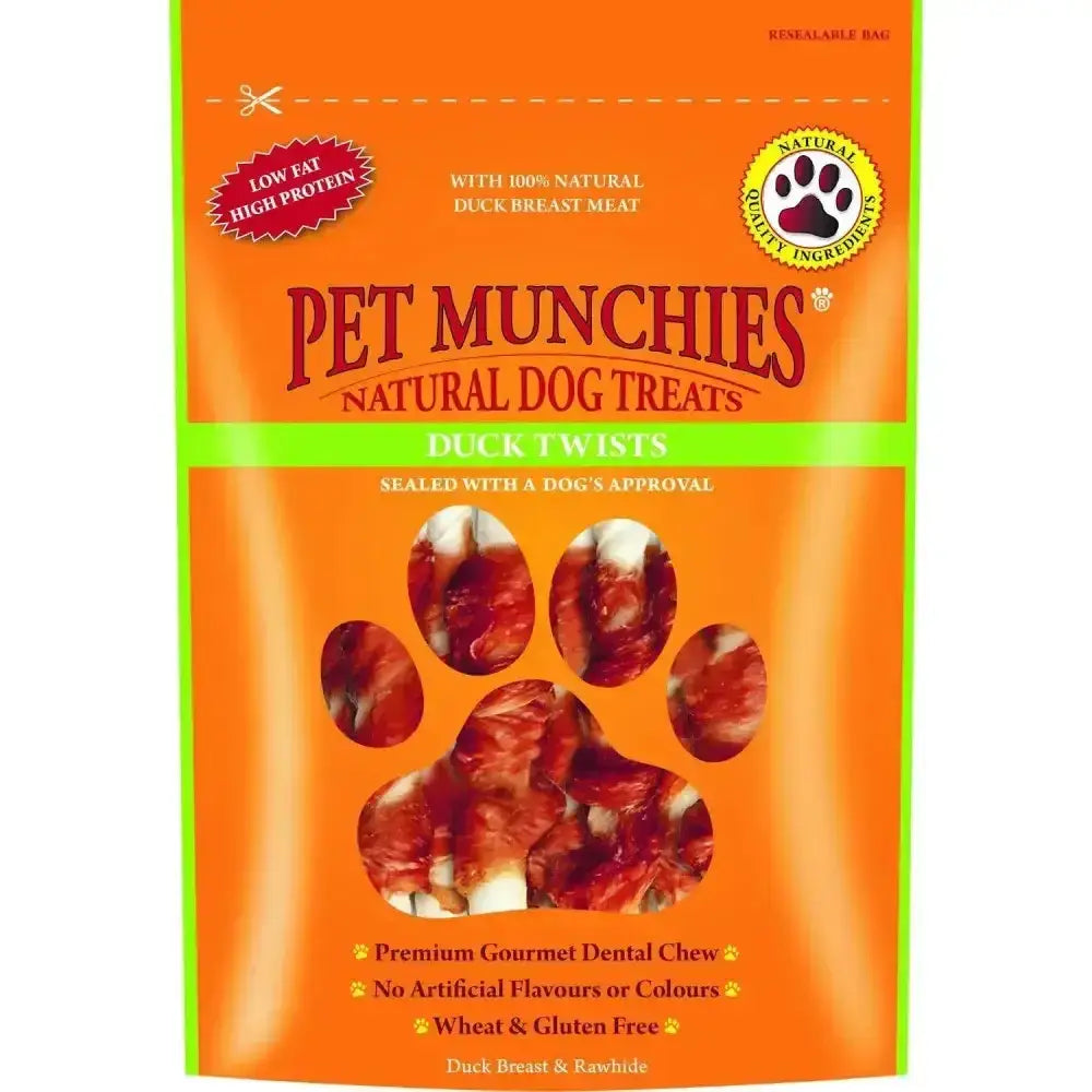 Orange and green package of pet munchies twists natural dog treats featuring duck twists with paw print window